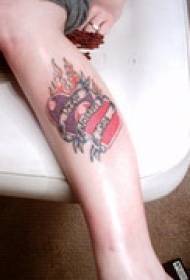 leg color two burning heart tattoo