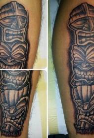 Tatuagem tribal perna preto sorriso marrom máscara