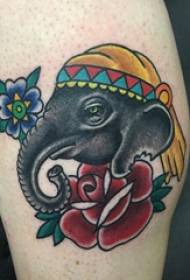 Europska djevojka tetovaža shank držak na slici tetovaža cvijeta i slona