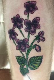 small fresh plant tattoo male shank on colored flowers Tattoo picture