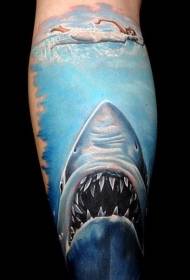 Colorful shark tattoo pattern in leg realism style