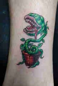 Planta tatuada caña masculina en imagen de tatuaje de piraña coloreada