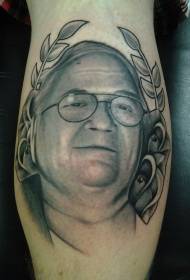 Leg gray man portrait with flower tattoo pattern