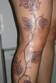 Nohy hnědé s listy vinných tetovacích obrázků