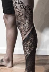 multi Creative tattoo pattern on the geometrical lines on the calf