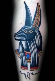 Ang luma na kulay na Egyptian Anubis god leg tattoo