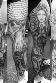 Beautiful black and white letters religious figures tattoos on the legs