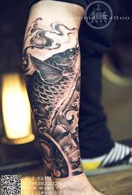 Personal calf squid tattoo