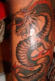 Roaring dragon tattoo pattern on the leg