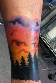 Leg colored sunrise and forest tattoo pattern