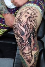 Knee black sailboat with squid tattoo pattern