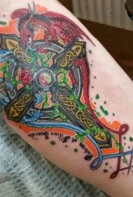 New school painted celtic cross with dragon tattoo pattern