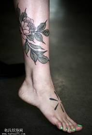 Beautiful floral tattoo pattern on calf