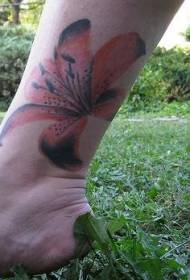 Calf orange and black lily tattoo pattern