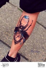 Calf clock combines insect and diamond tattoo patterns