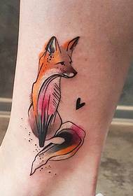 Cute little fox tattoo tattoo on the outside of the calf