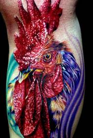 a colorful cock tattoo on the calf