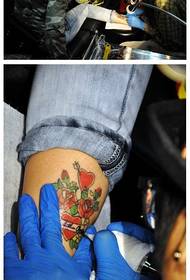 Calf rose heart tattoo scene