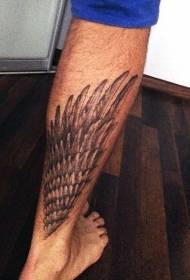 ふくらはぎの現実的な黒い翼のタトゥーパターン