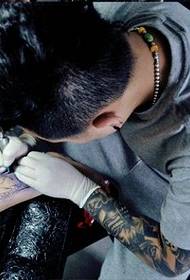 Tattoo artist tick in the calf
