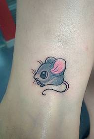 a little cute little mouse tattoo tattoo on the calf