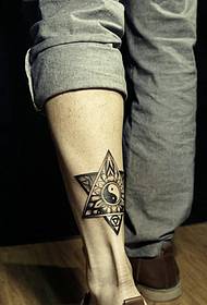 Black and white style six-pointed star and Taiji leg tattoo