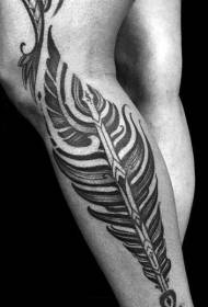Beautiful black and white feather tattoo pattern on calf