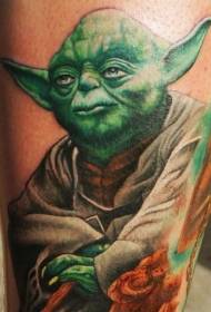 Calf painted green Yoda tattoo pattern