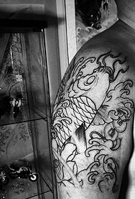 Big arm, low-key line, squid, tattoo, tattoo