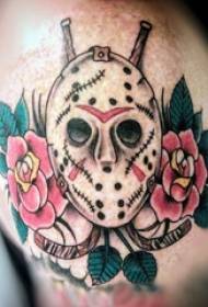Seuns arms op geverfde plantblomme en masker tatoeëermerke