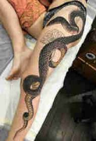 Snake tattoo picture boy thigh on snake tattoo picture