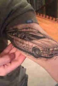 Car tattoo boy big arm on black car tattoo picture