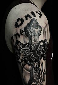 Stor arm personlighet svartvitt kors totem tatuering bild