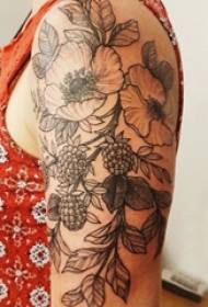 Tatuaje minimalista del brazo grande del niño en la imagen de tatuaje de planta negra