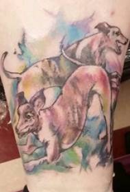 Liten djur tatuering tjej färgade valpar tatuering bild på låret