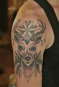 Big black and white deer tattoo is very cute