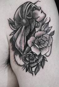 Big black and white beauty portrait tattoo