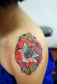 Brightly colored big arm rose tattoo picture