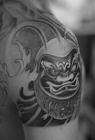 Personality black and white totem tattoo on the big arm