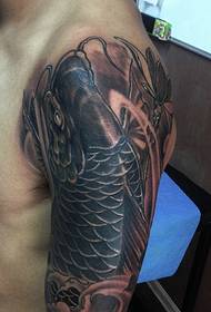 Vibrant big arm black and white big squid tattoo