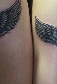 Big arm personality couple feather tattoo tattoo