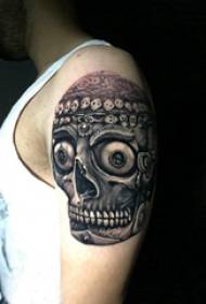 skullTattoo picture, handsome skull tattoo picture on the male arm