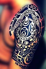 Classic old traditional big arm totem tattoo tattoo