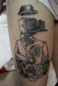 Thigh black human body with old camera and hat tattoo pattern