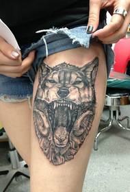 Black gray wolf tattoo pattern on the legs