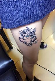 Tattoo of a little elephant god girl tattoo on the thigh