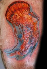 Colorful jellyfish tattoo on the thigh