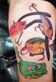 Thigh different colored various fish tattoo patterns