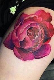 Girl's thigh on painted plant material flower tattoo picture