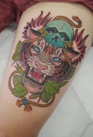Schoolgirl thighs painted simple lines plant leaves and tiger tattoo pictures